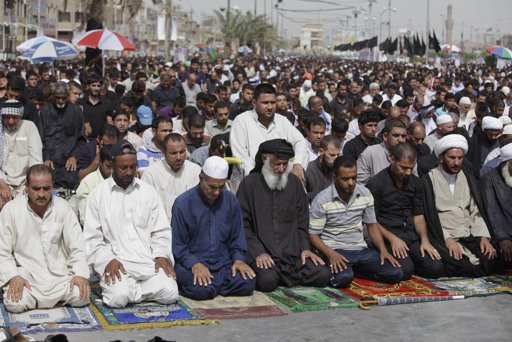  Followers of radical Shiite cleric Muqtada al-Sadr attend Friday prayers in the Shiite neighborhood of Sadr City.