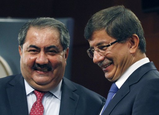  Iraqi Foreign Minister Hoshyar Zebari, left,  –  his Turkish counterpart Ahmet Davutoglu speak to the media.