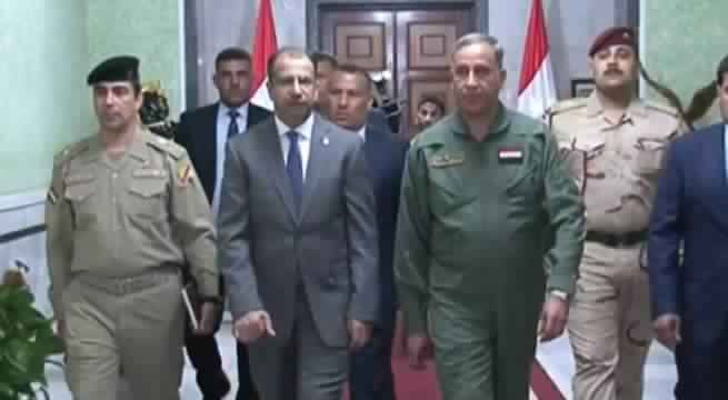 Defense Minister Khaled al-Obeidi and Parliament Speaker Salim al-Jubouri