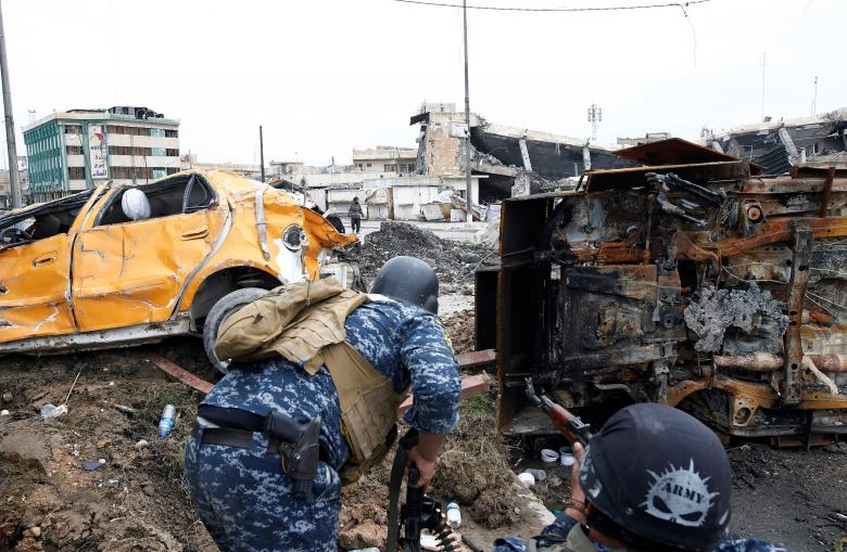  Five officers, 12 suicide bombers killed in western Mosul in 24 hours