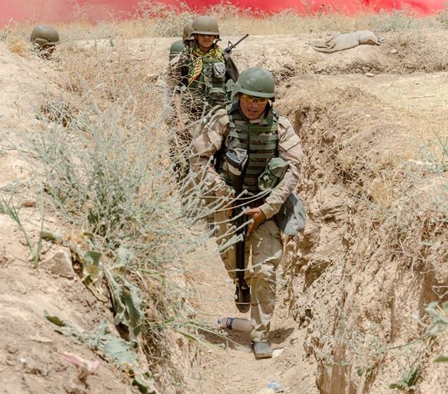  Peshmerga dig trenches to hamper Iraqi troops advance toward exit