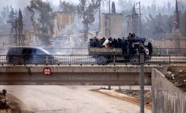  Buses evacuate thousands of exhausted Aleppo residents in ceasefire deal