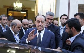 Maliki returns to Baghdad