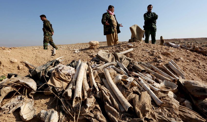  Relics of tens of victims found in mass grave, south of Mosul