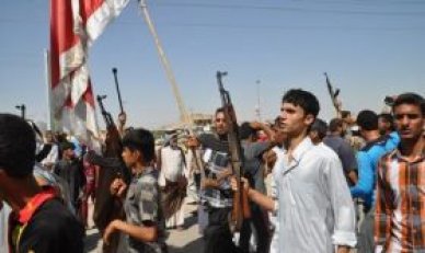  Dozens demonstrate against coalition’s intervention in Tikrit battle