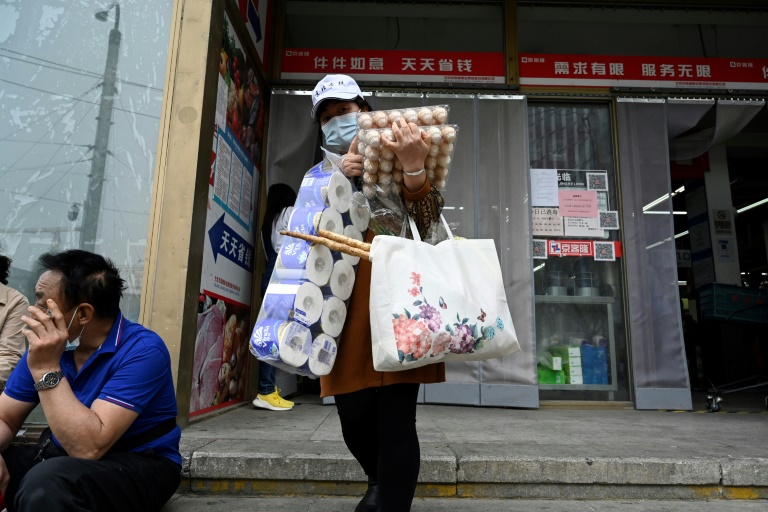  Beijing Covid spike prompts mass testing, panic buying