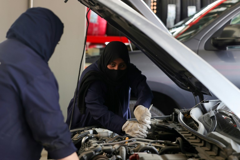  Saudi women move from behind wheel to under the hood