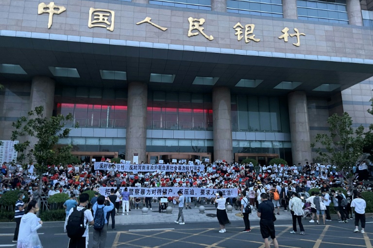  China detains alleged bank fraud ‘gang’ after rare mass protests