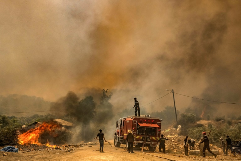  Morocco firefighters battle infernos as villagers flee