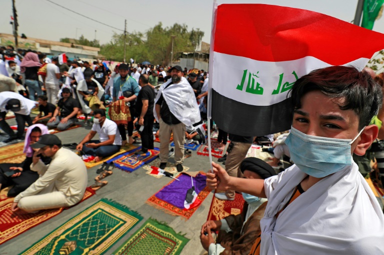  Sadr supporters attend Friday prayer service in Iraq’s capital