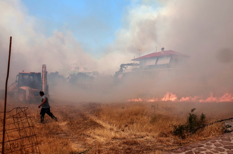  Greek firefighters in uphill battle to save famed natural park