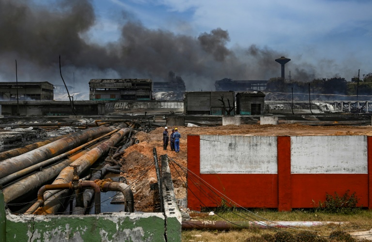  Cuba unable to identify remains of 14 firefighters after fuel plant blaze