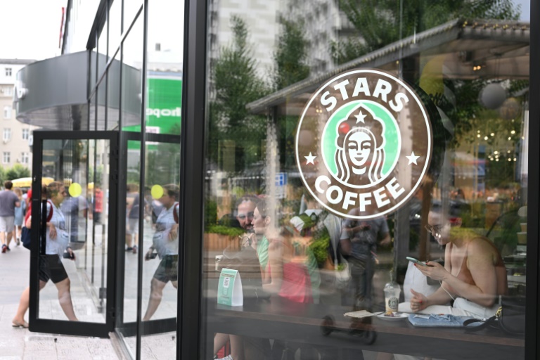  Pro-Putin rapper opens Starbucks successor in Moscow