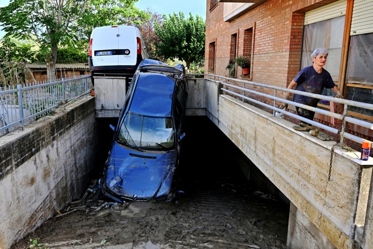  ‘Like a waterfall’: Italy storms kill 10, spark climate debate