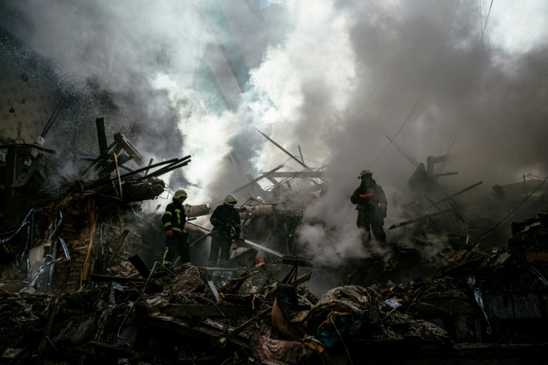  Death toll from missiles on Ukraine town rises to 14