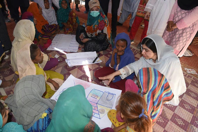  Malala visits women at flood camps in Pakistan