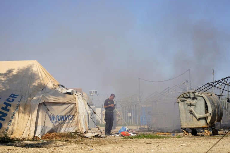  Cyprus police fire tear gas after migrant camp clashes