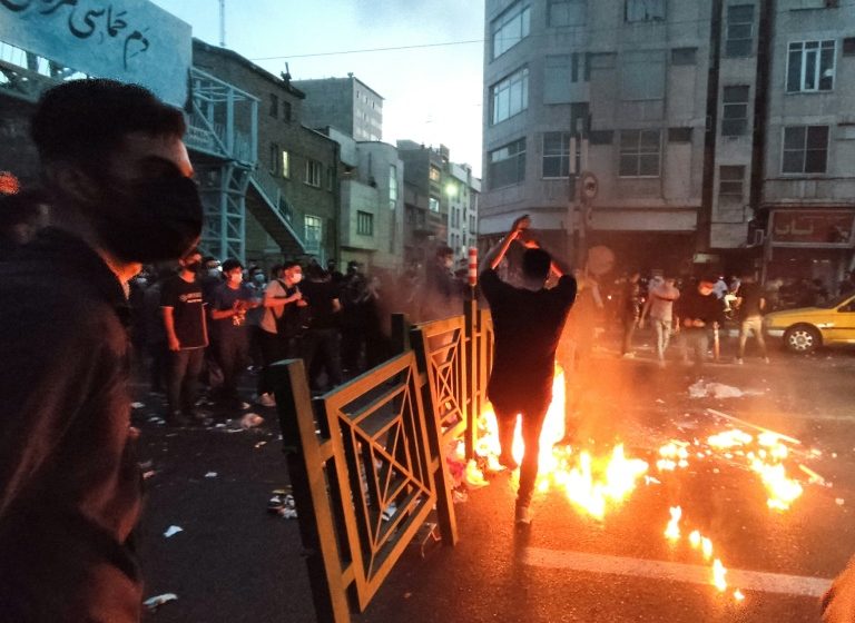  After dark, Iran security forces take aim at protest buildings