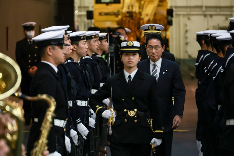  Japan PM pledges to boost military capacity