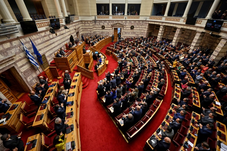  Greek government survives vote over wiretap scandal