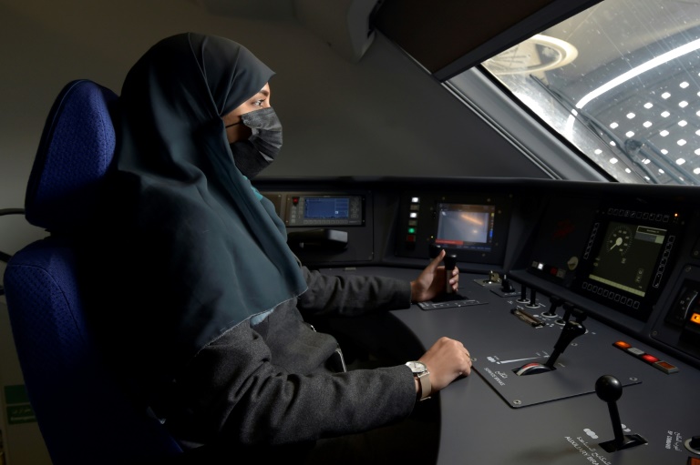  Women drive fast train to Mecca as Saudi workforce evolves