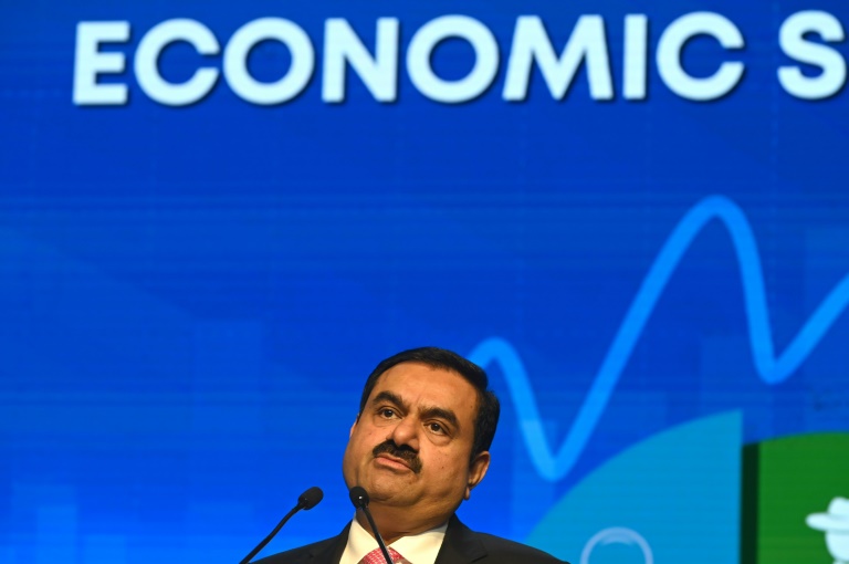  India’s Adani shares plunge again after stock sale cancelled