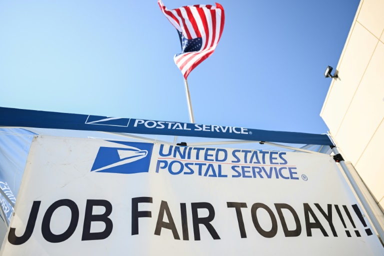  US sees surprise hiring surge as unemployment edges down