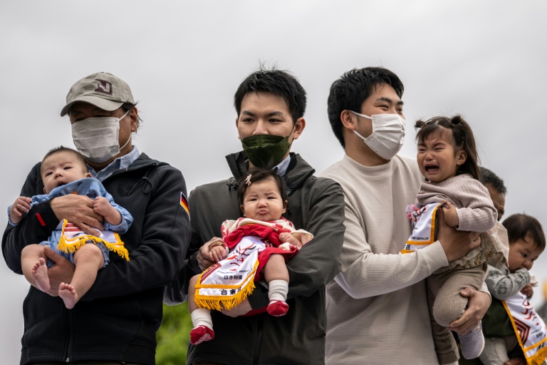  Japan PM unveils $25 bn plan to tackle birthrate crisis