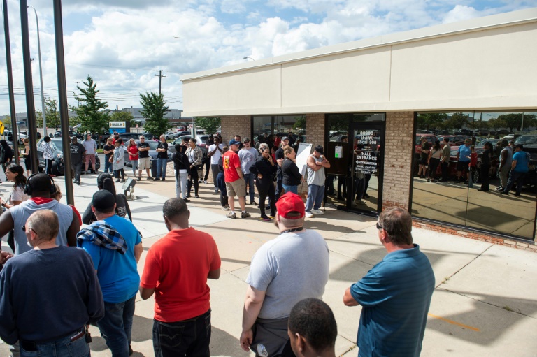  US auto workers, companies face off on day two of strike