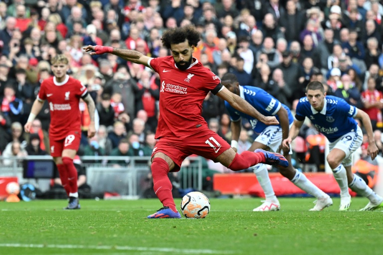  Salah double downs 10-man Everton, sends Liverpool top