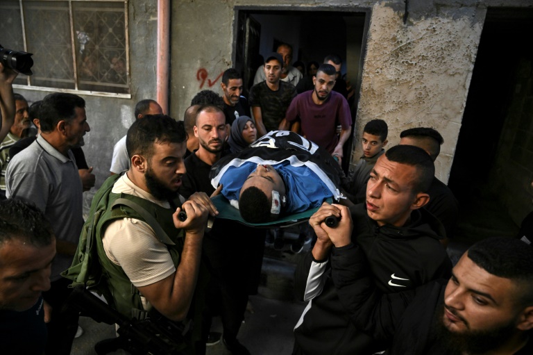  Mass militant funeral after deadliest West Bank raid since 2005