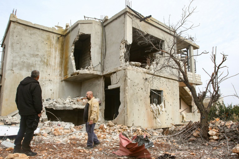  Lebanese return to find bombed-out houses near Israel border