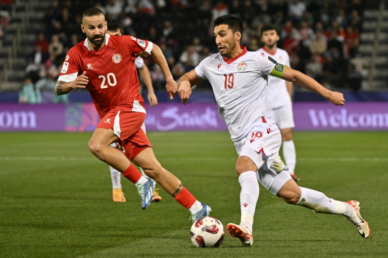  Debutants Tajikistan fight back to reach Asian Cup knockouts