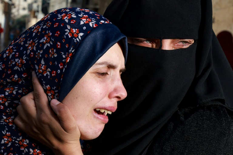  Gazan woman mourns twin babies killed in strike